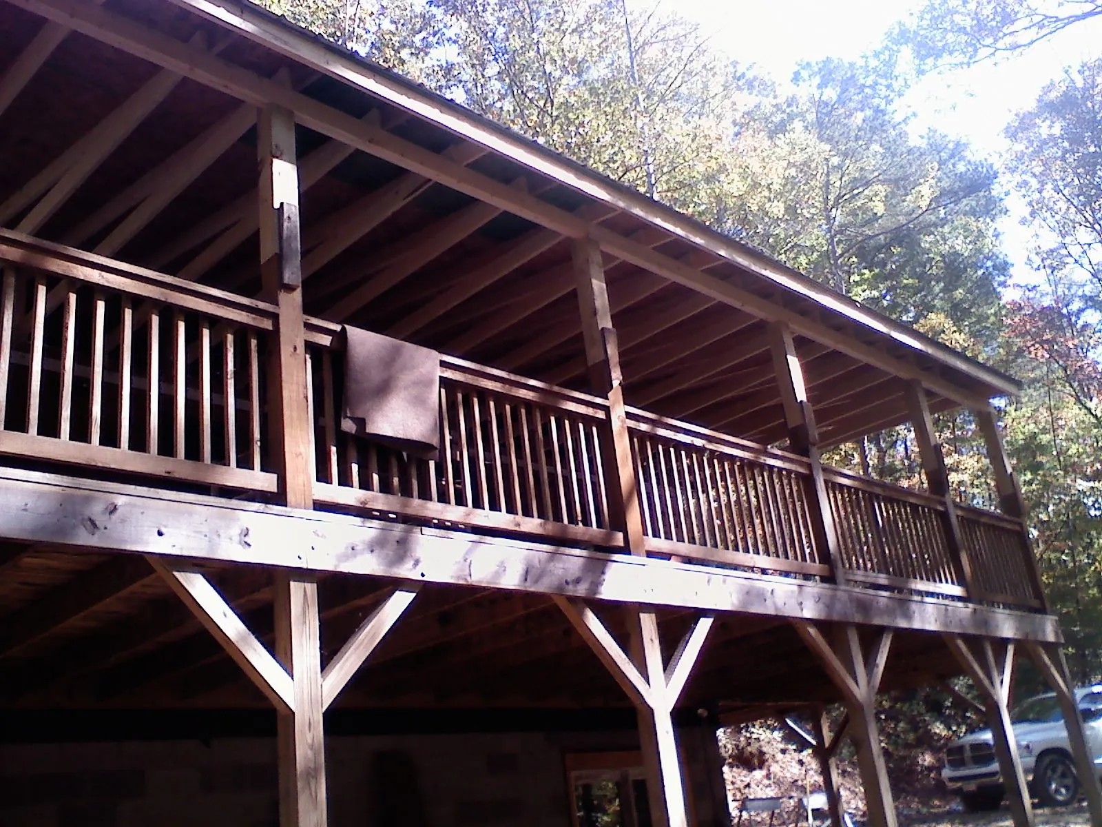 Timber framing under a new elevated porch and deck — Roof Leak Repair in Hampton by Roofing Brothers